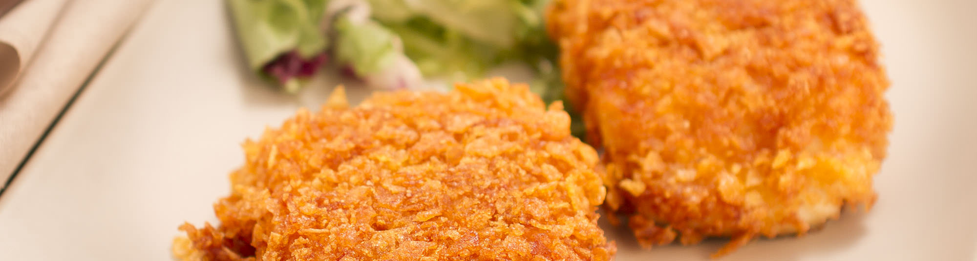 Merluza rebozada en corteza de cereales