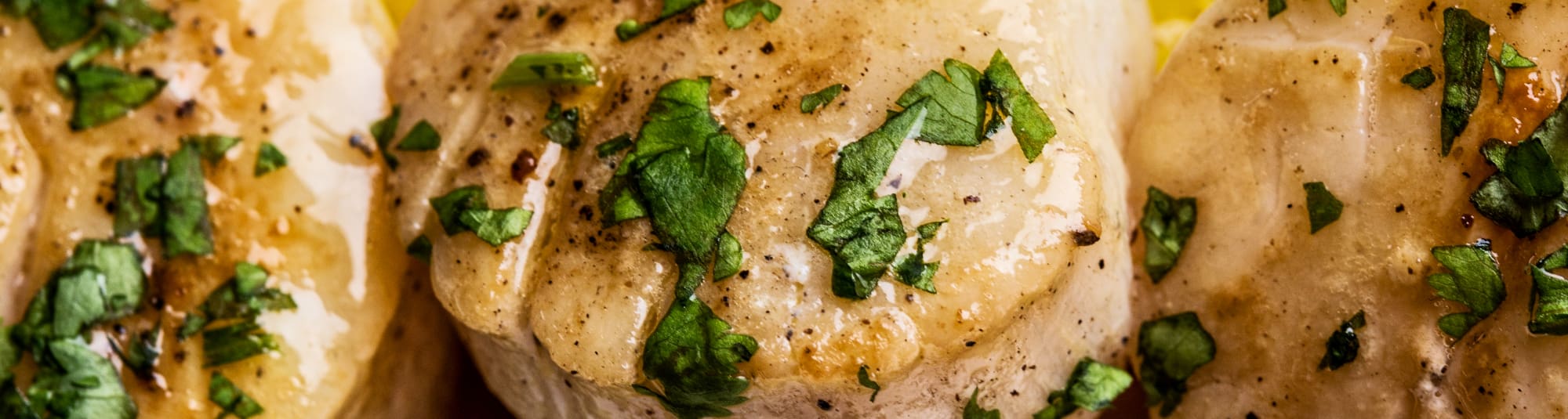 Medallones de merluza a la plancha con limón y ajo