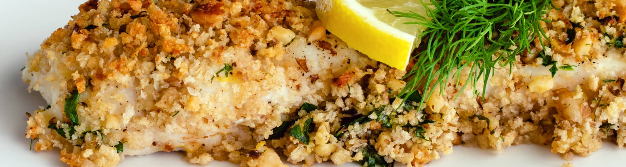 Pescado al horno con cebolla asada